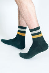 Close up shot of Tailored Union green and yellow tube socks