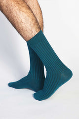 Close up photo of man’s feet wearing Tailored Union dress socks